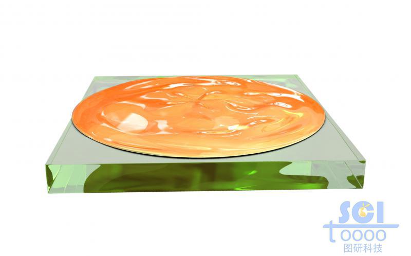 玻璃板上攤開圓形液滴/水滴